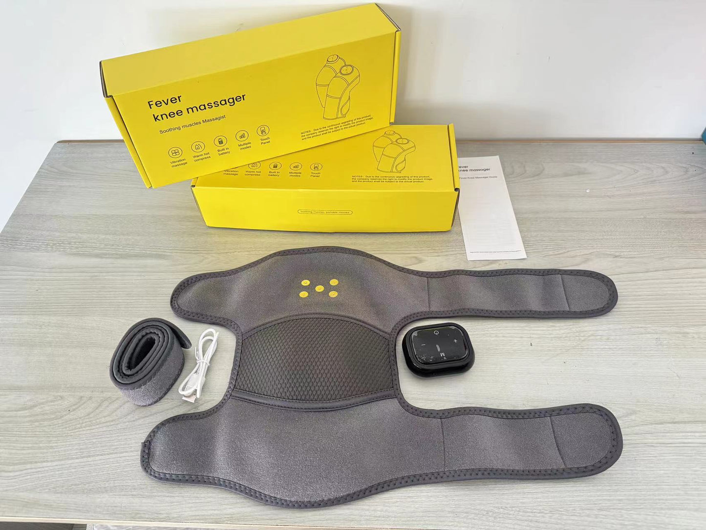 Self-heating knee massager